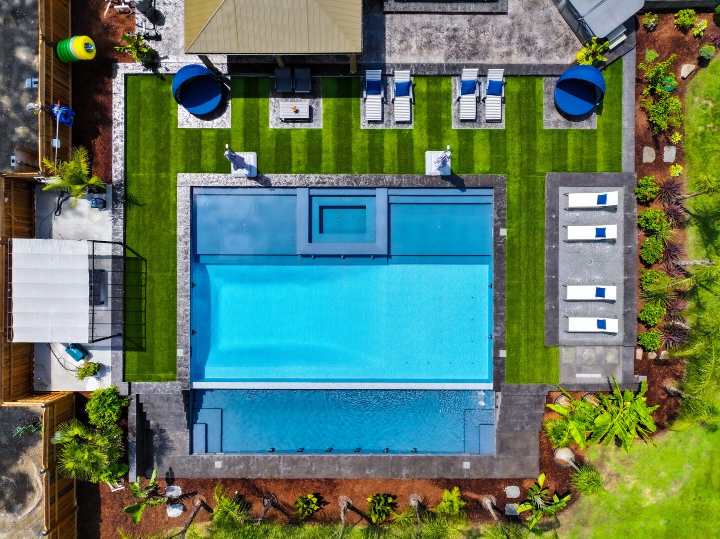 Luxurious outdoor pool with seating arrangement