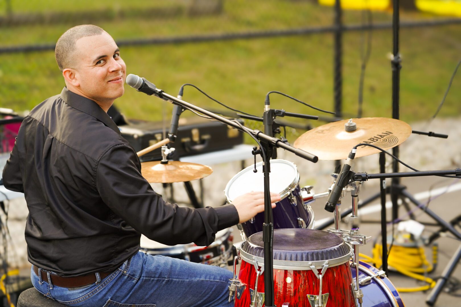 Drummer playing percussion outdoors