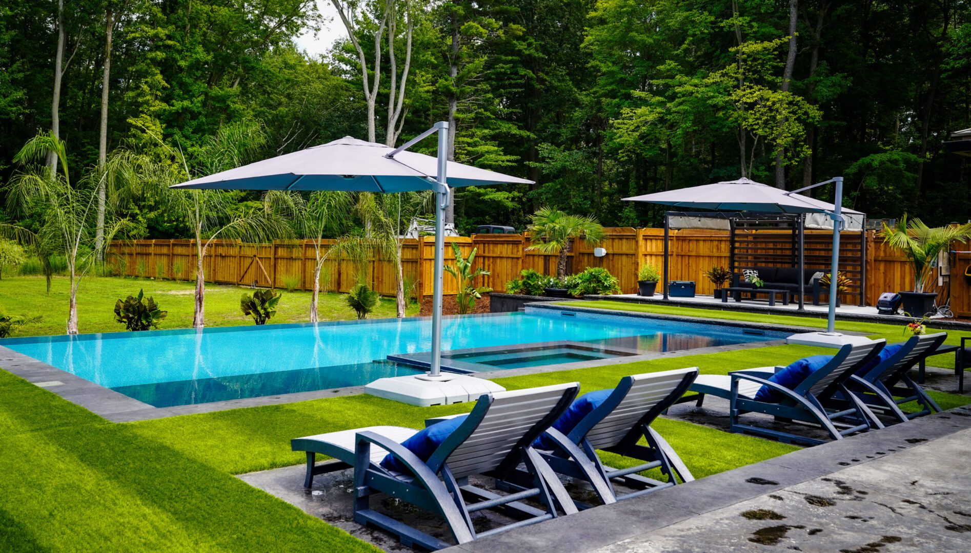 Serene poolside with lush greenery